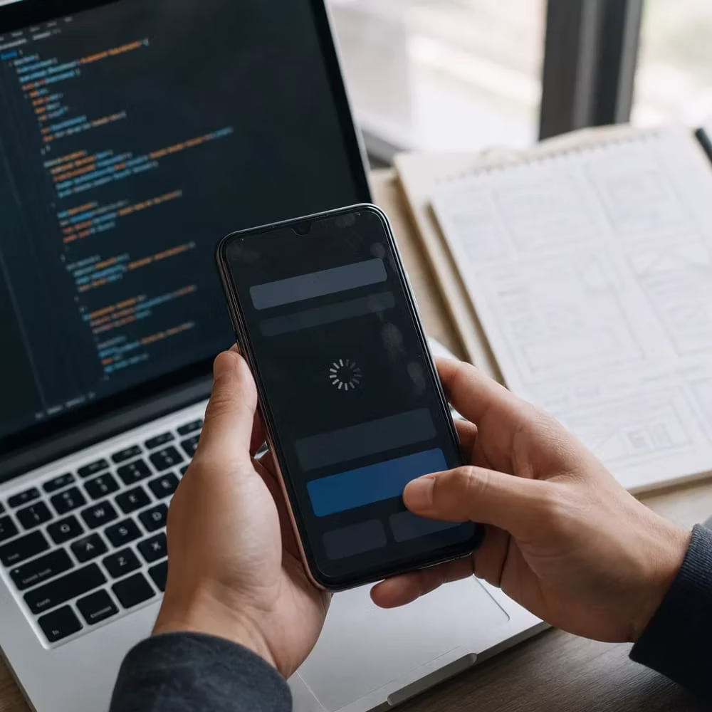 Hands testing a React Native app